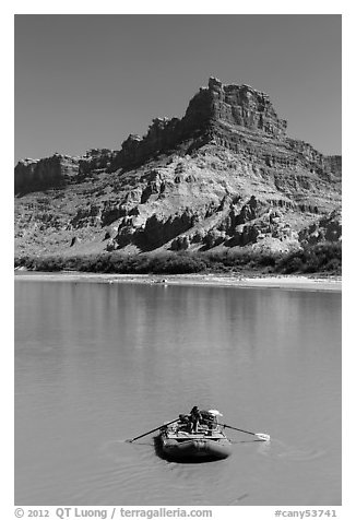 Woman paddling raft on Colorado River. Canyonlands National Park (black and white)