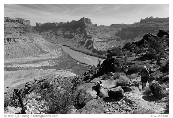Hikers on steep trail to Dollhouse from Spanish Bottom. Canyonlands National Park (black and white)