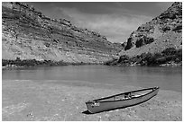 Red Canoe on beach near Confluence. Canyonlands National Park, Utah, USA. (black and white)