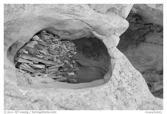 Granary nested in arch, Aztec Butte. Canyonlands National Park (black and white)