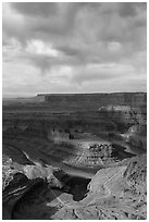 Gooseneck and stormy sky with virgas. Canyonlands National Park ( black and white)