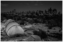Tents at night in the Dollhouse. Canyonlands National Park, Utah, USA. (black and white)