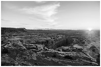 Sunrise over Jasper Canyon from Petes Mesa. Canyonlands National Park ( black and white)