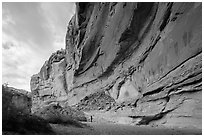 Hiker looking, the Great Gallery, Horseshoe Canyon. Canyonlands National Park ( black and white)