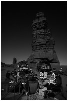 Car-camping at the base of Standing Rock at night. Canyonlands National Park, Utah, USA. (black and white)