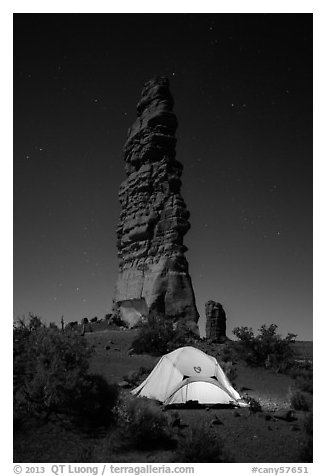 Tent at the base of Standing Rock at night. Canyonlands National Park (black and white)