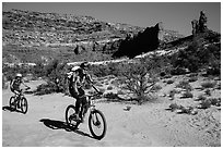 Mountain bikers in Teapot Canyon, Maze District. Canyonlands National Park ( black and white)
