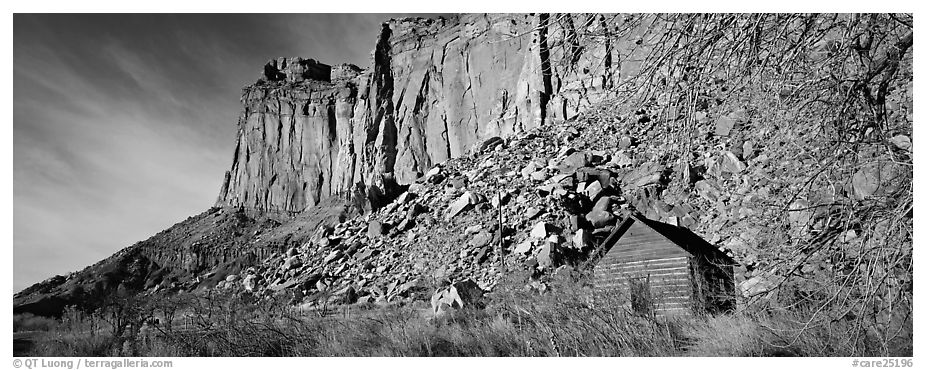 Fruita pioneer school house at the base of sandstone cliffs. Capitol Reef National Park (black and white)