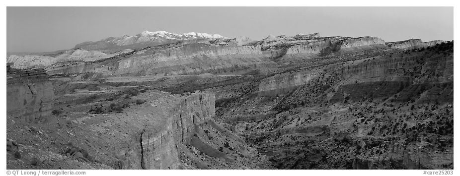 Panorama of multi-hued cliffs and Henry Mountains at dusk. Capitol Reef National Park (black and white)