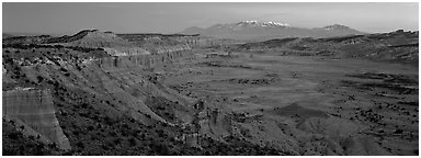 Desert view with cliffs and mountains at dusk. Capitol Reef National Park (Panoramic black and white)