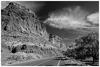 Rood, cliffs, and orchard in autumn. Capitol Reef National Park, Utah, USA. (black and white)