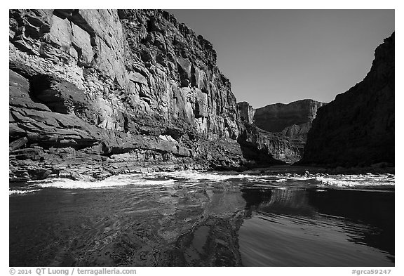 River-level view of glassy waters before rapids, Marble Canyon. Grand Canyon National Park (black and white)