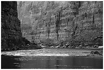 Glassy river and rapids below Redwall limestone canyon walls. Grand Canyon National Park ( black and white)