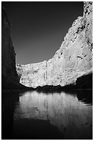 Steep limestone canyon walls reflected in Colorado River, early morning. Grand Canyon National Park ( black and white)