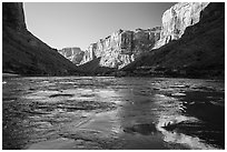 Cliffs reflected in Colorado River rapids, morning. Grand Canyon National Park ( black and white)