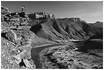Photographer on steep cliff above Unkar rapids. Grand Canyon National Park ( black and white)