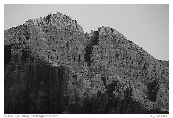 Last light illuminates distant cliffs. Grand Canyon National Park (black and white)