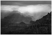 Canyon ridges with dramatic clouds and sunrays. Grand Canyon National Park ( black and white)