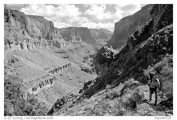 Backpacker on trail above Tapeats Creek. Grand Canyon National Park (black and white)