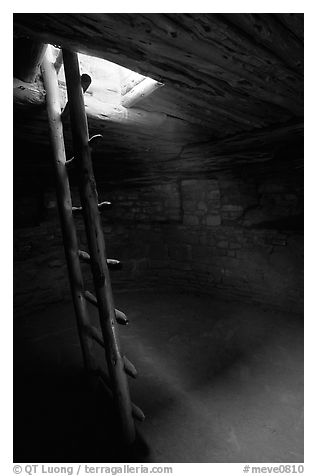 Ladder through a smoke hole in Spruce Tree house. Mesa Verde National Park (black and white)