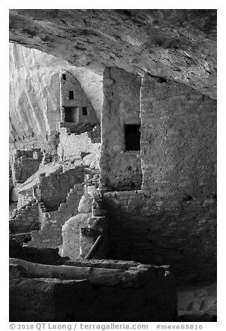 Side view of structures abutting cliff, Long House. Mesa Verde National Park (black and white)