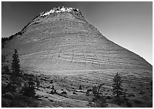 Checkerboard Mesa with top illuminated by sunrise. Zion National Park ( black and white)