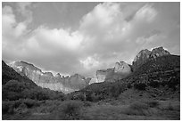 Wide view of Towers of the Virgin and clouds at sunrise. Zion National Park, Utah, USA. (black and white)