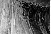 Striated rock in  base alcove of  Double Arch Alcove, Middle Fork of Taylor Creek. Zion National Park ( black and white)