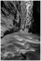 River flows beneath soaring sandstone walls, the Narrows. Zion National Park ( black and white)