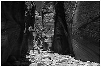 Hikers in Orderville Canyon. Zion National Park ( black and white)