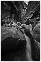 Cascade and boulder in Orderville Canyon. Zion National Park ( black and white)