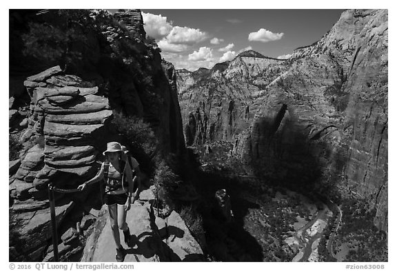 Hiker holds onto chain, Angels Landing. Zion National Park (black and white)