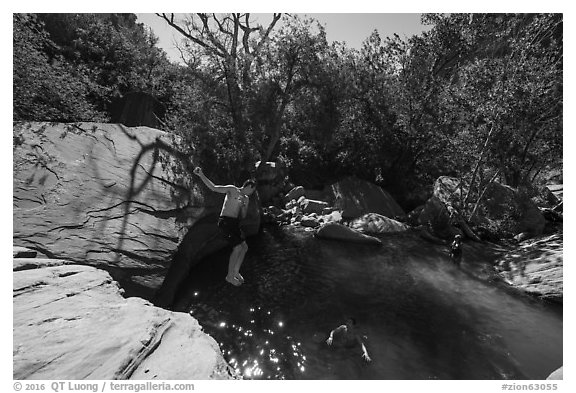 Man jumping into water, Pine Creek. Zion National Park (black and white)