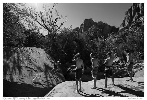 Children on rock above swimming hole, Pine Creek. Zion National Park (black and white)