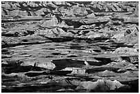 Badland ridges and prairie from above, sunrise. Badlands National Park ( black and white)