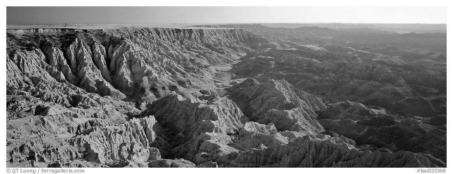 Badlands carved into prairie by erosion. Badlands National Park (black and white)