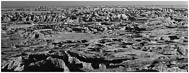 Scenic view of prairie and badlands extending to horizon, Pinnacle Overlook. Badlands National Park (Panoramic black and white)