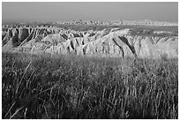 Mixed grass prairie alternating with badlands. Badlands National Park, South Dakota, USA. (black and white)