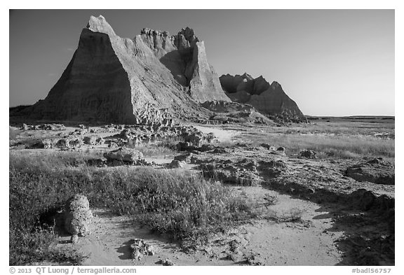 Brule formation butte raising from prairie. Badlands National Park (black and white)