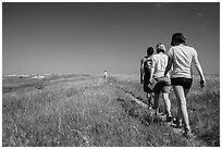 Hikers on Medicine Root Trail. Badlands National Park ( black and white)