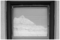 Butte, Window reflexion, Badlands National Park Headquarters. Badlands National Park ( black and white)