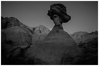 Pedestal rock at badlands at dusk. Badlands National Park, South Dakota, USA. (black and white)