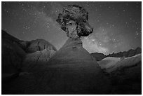 Pillar with caprock, badlands, and Milky Way. Badlands National Park ( black and white)