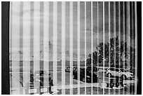 Badlands and parking lot, Visitor Center window reflexion. Badlands National Park ( black and white)