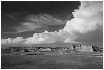 Afternoon clouds above buttes and prairie, South Unit. Badlands National Park, South Dakota, USA. (black and white)