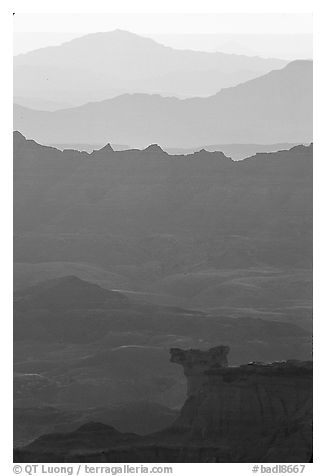 Ridges of the Stronghold table in the southern unit, sunrise. Badlands National Park (black and white)