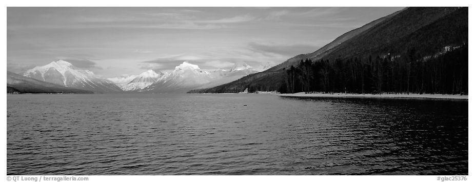Snowy mountains across Mc Donald Lake. Glacier National Park (black and white)