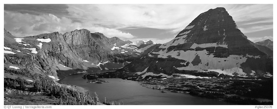 Alpine lake and triangular peak. Glacier National Park (black and white)