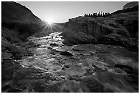 Outlet stream of Swiftcurrent Lake, sunrise. Glacier National Park, Montana, USA. (black and white)