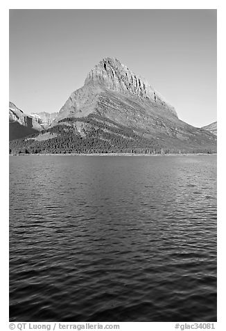 Grinnell Point across Swiftcurrent Lake, sunrise. Glacier National Park (black and white)